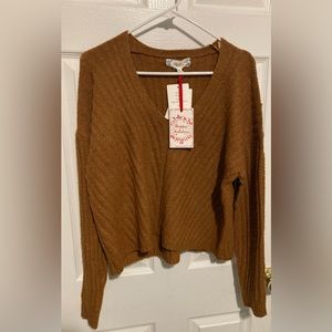 NWT Size large Pink Rose waist length v neck sweater.